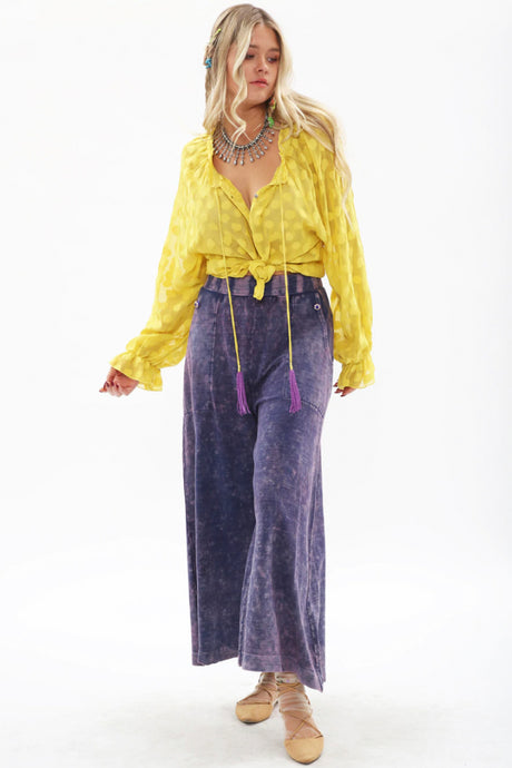 Bring back the 70's with these trendy acid wash French terry wide-leg pants that feature beautiful crystal-embedded buttons. Elastic waistband, Pair with a bodysuit, pumps, or favorite flats and a handbag for the perfect day look.
