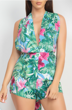 Load image into Gallery viewer, Have all eyes in this must-have romper. Maui Tropical Crisscross Romper is very luxurious, comfortable, and perfectly flattering. Featuring a woven tropical design, a plunging neckline and a figure-hugging fit. Style this with tie up heels and statement accessories to complete the look.
