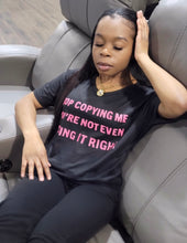 Load image into Gallery viewer, Make this cute graphic T apart your wardrobe because you&#39;re the trendsetter babe! This top adds the perfect touch to any outfit you want to make not-so-simple. Featuring a crew neck, short sleeves, and soft fabric. Style with a pair of leggings and heels for a complete look.
