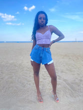 Load image into Gallery viewer, We are obsessed with this sexy lace cami tank top for the upcoming season. Featuring a lavender material with lace trim detailing, sweetheart neckline, and a padded cup design, we are in love. Wear with your go-to jeans and strappy heels for the perfect brunch date look.
