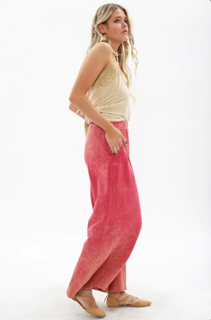 Bring back the 70's with these trendy acid wash French terry wide-leg pants that feature beautiful crystal-embedded buttons. Elastic waistband, Pair with a bodysuit, pumps, or favorite flats and a handbag for the perfect day look.