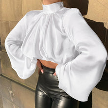 Load image into Gallery viewer, Girl we are lovin&#39; this She&#39;s So Classy Blouse crop top, featuring a white satin material, with a turtleneck collar. Team this with matching satin trousers and killer heels for that last minute night out outfit. 
