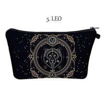 Load image into Gallery viewer, Leo. Whether you’re an imaginative Pisces, a passionate Cancer, or a practical Taurus, the pretty makeup bag Each captures the essence of a zodiac sign with beautiful artwork. The luxe fabric resists dirt, stains, shrinking, and stretching. Perfect for toiletries and makeup. 
