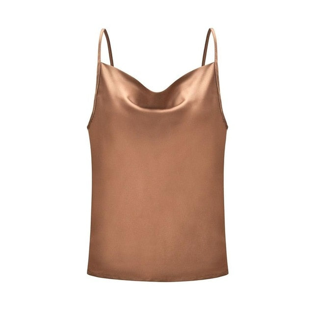 An elevated silk cami that makes a classy and romantic statement. This top is the perfect addition to your wardrobe babe! Featuring a cowl neckline what's not to love?! Style this sexy camisole top with your favorite denim jeans  or shorts, transparent mule and handbag for a casual but effortlessly stylish look.
