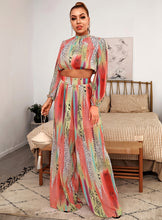 Load image into Gallery viewer, Your next vacation outfit is calling! Summertime doesn&#39;t get any prettier than this tropical print pant set! Featuring a fully-lined wide leg pant with a high rise fit, zip closure and matching crop top with back zip closure; we&#39;re obsessed! Style with a high heel and stylish handbag for a complete look. 
