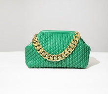 Load image into Gallery viewer, Complete your look with this chic faux leather bag featuring a thick gold chain and fully lined interior. Roomy enough to fit all of your day-to-day essentials. Pair with your little black dress for a night out or add some glitz and glam to your denim looks.
