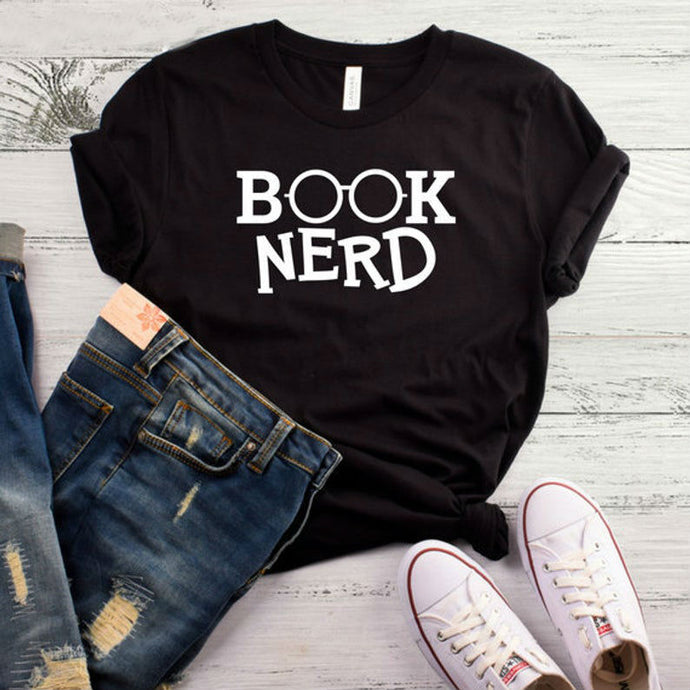 If you love to read books this shirt is for you. Get cozy and snug with hot coco and a book. Style this with your favorite denim jeans, high heels and handbag for a effortless outfit of the day.